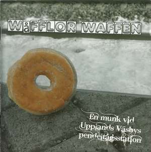 Wafflor Waffen - En Munk Vid Upplands Vasbys Pendeltagstation (1).jpg